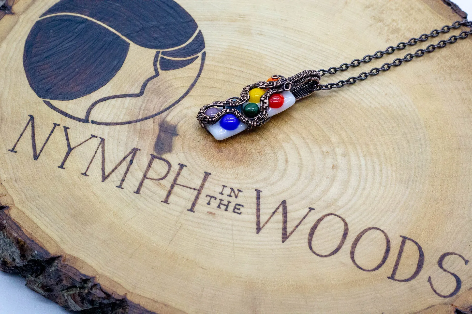 Chakra-Inspired Fused Glass Pendant with Copper Wire Wrapping