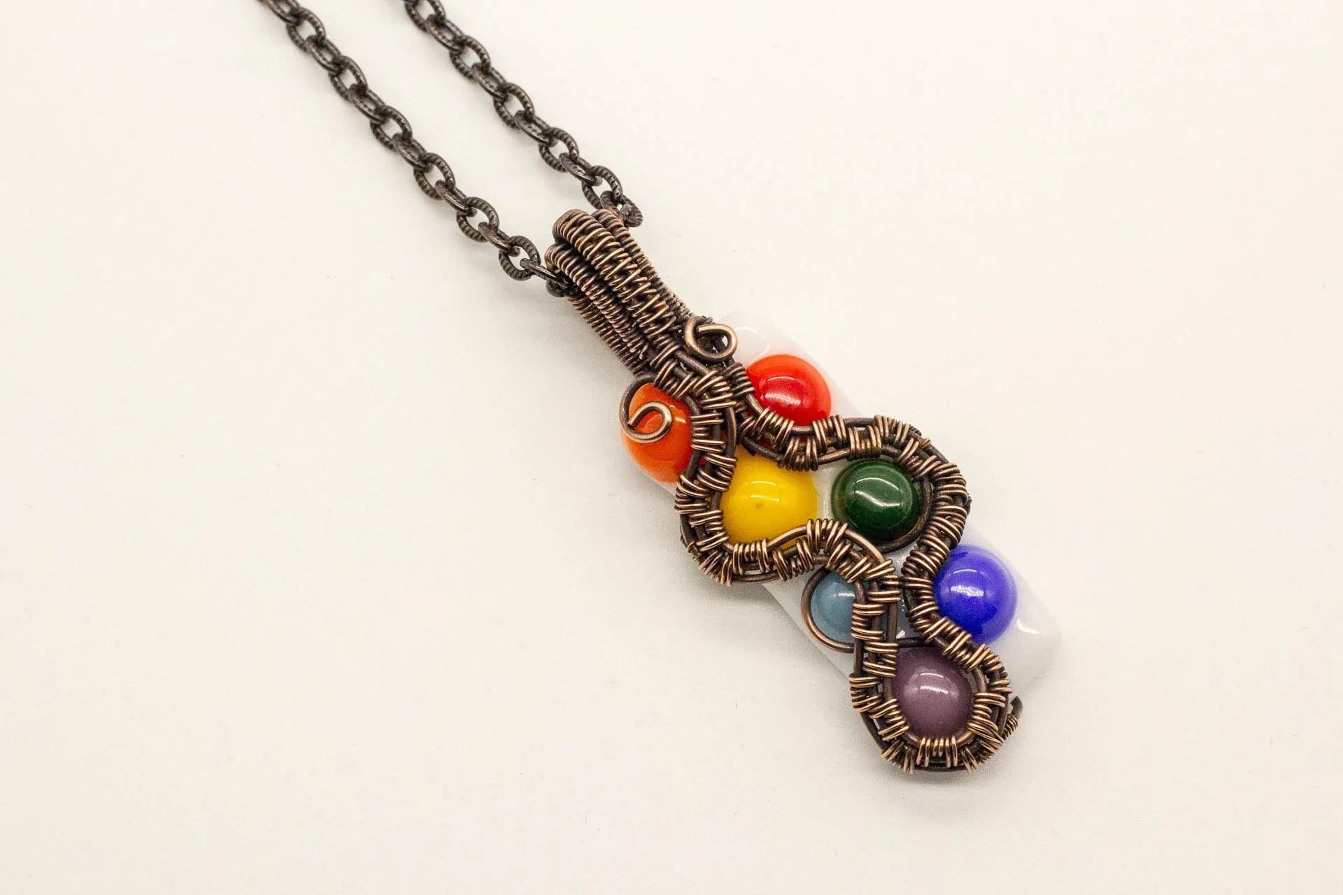 Chakra-Inspired Fused Glass Pendant with Copper Wire Wrapping
