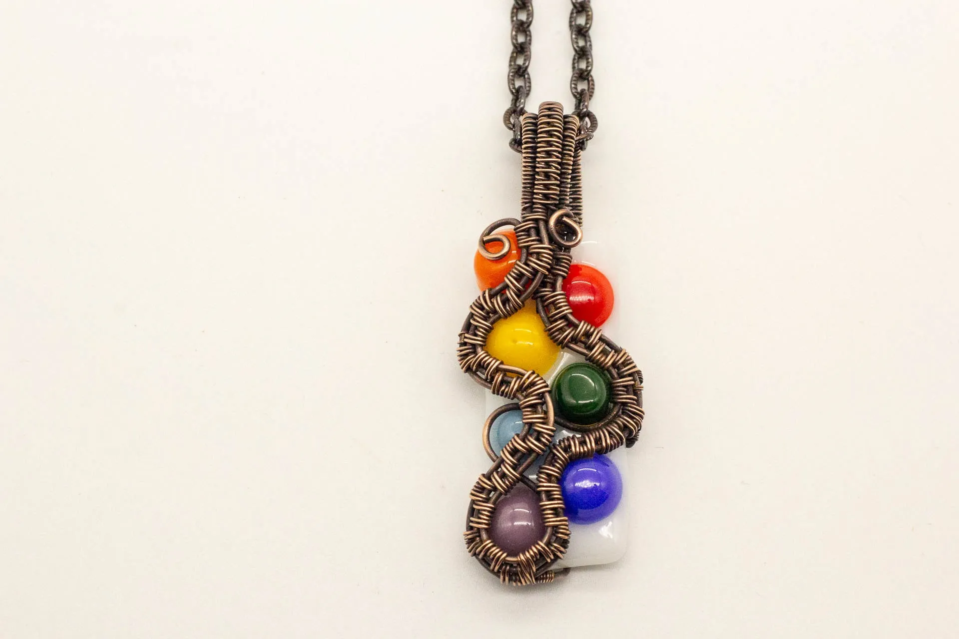 Chakra-Inspired Fused Glass Pendant with Copper Wire Wrapping