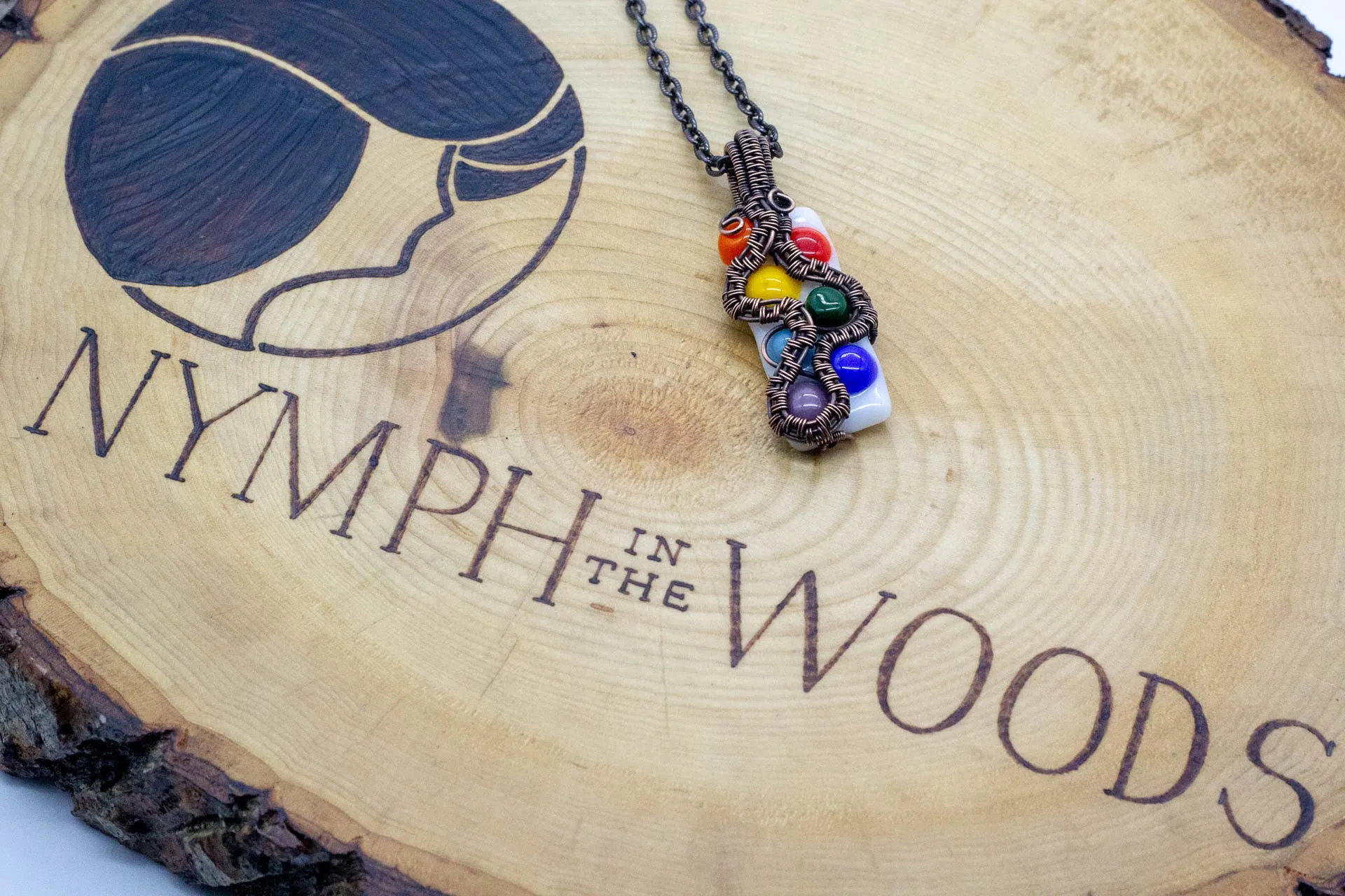 Chakra-Inspired Fused Glass Pendant with Copper Wire Wrapping