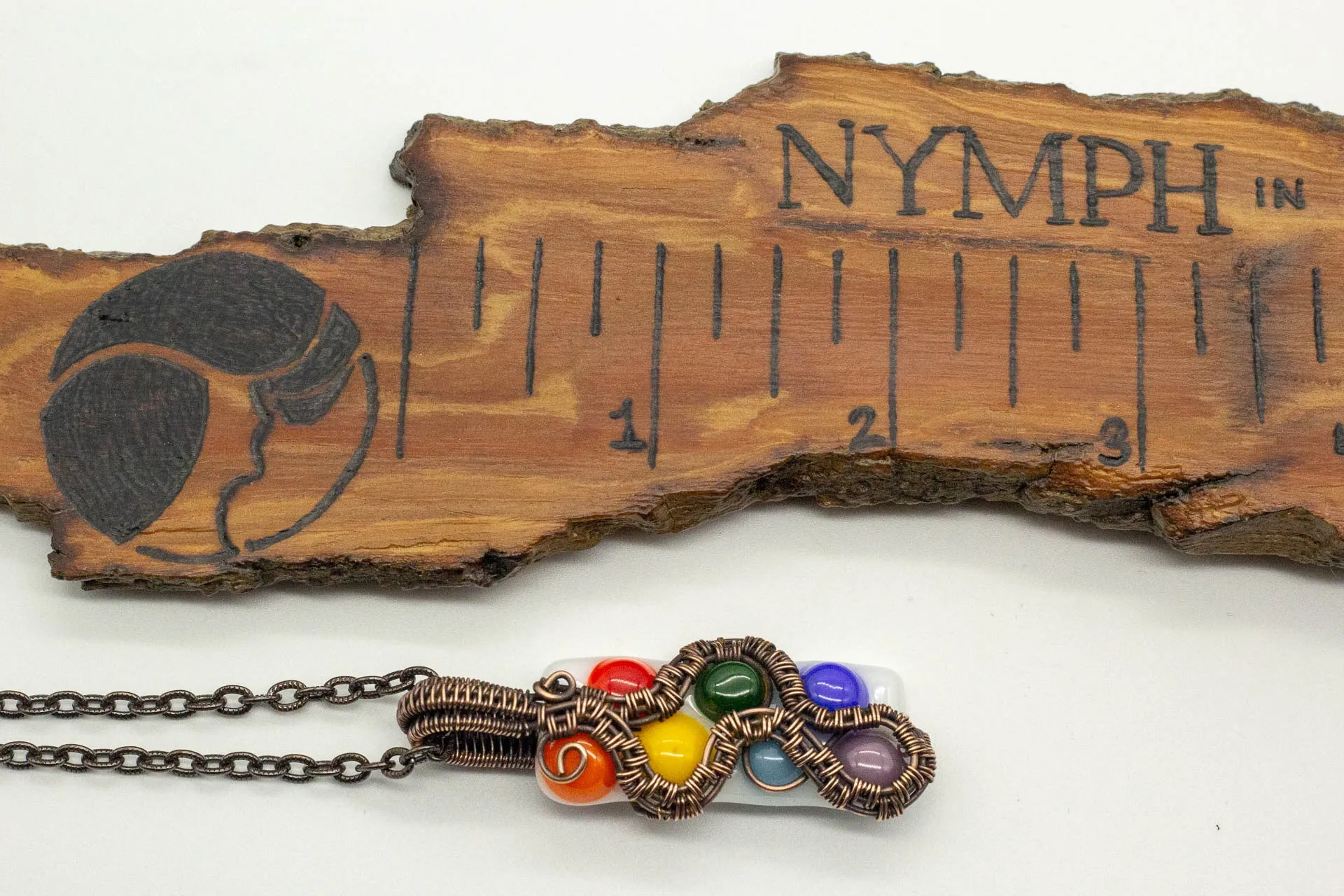 Chakra-Inspired Fused Glass Pendant with Copper Wire Wrapping