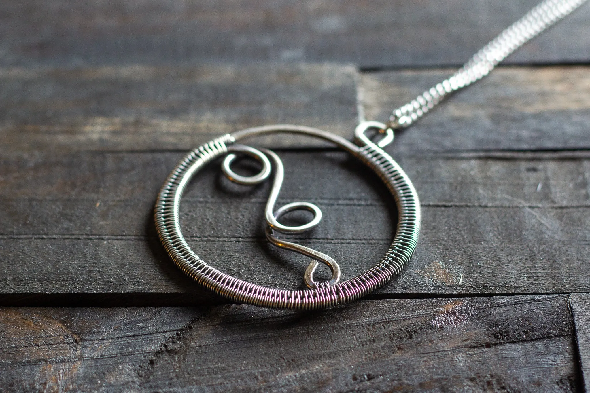 Circular Sterling Silver Wire Wrapped Pendant