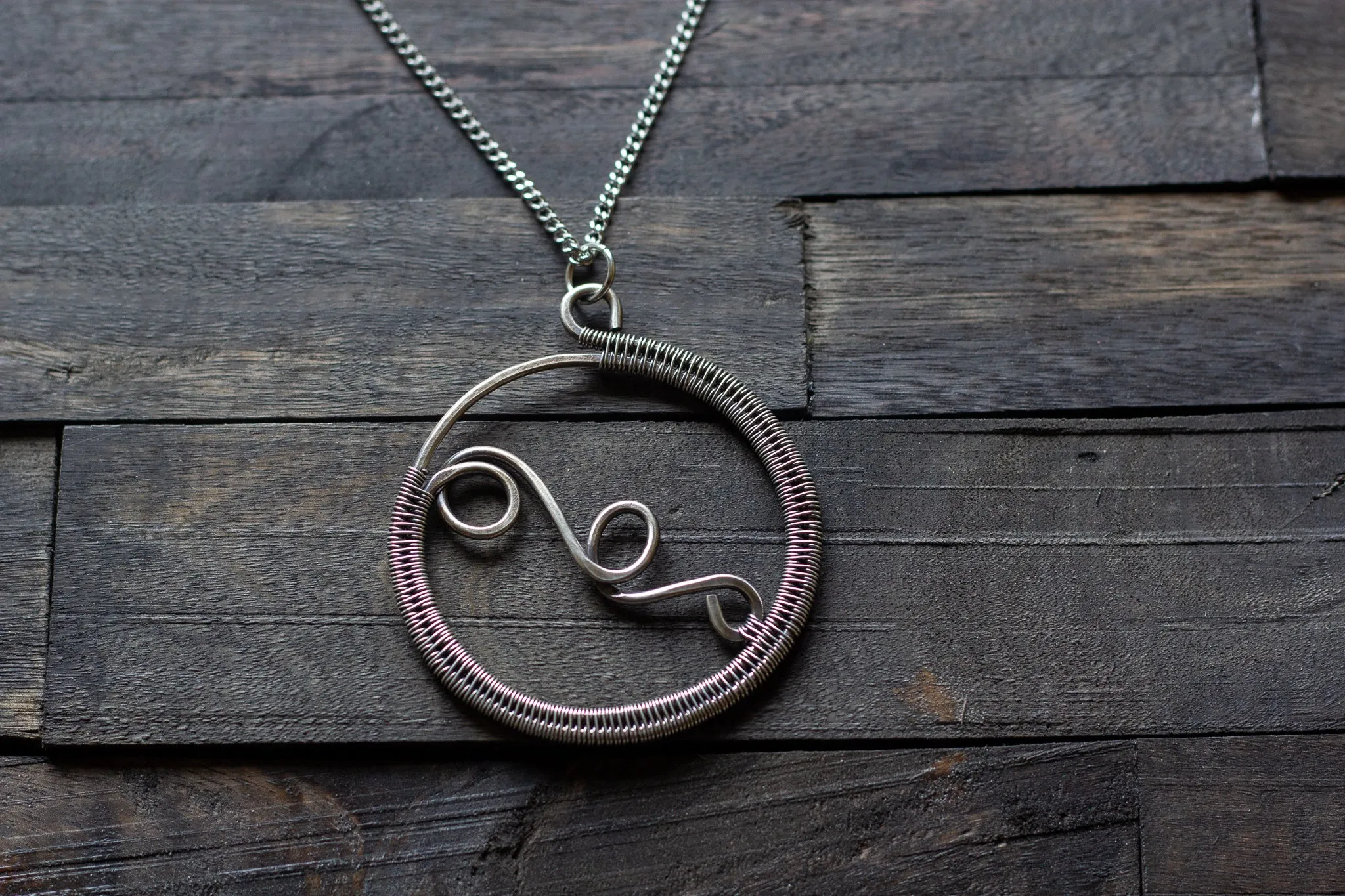 Circular Sterling Silver Wire Wrapped Pendant