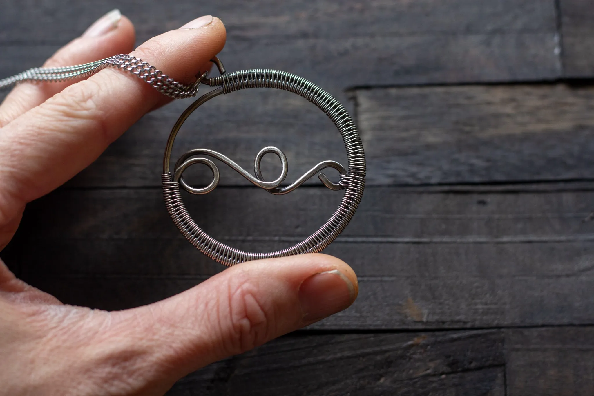 Circular Sterling Silver Wire Wrapped Pendant
