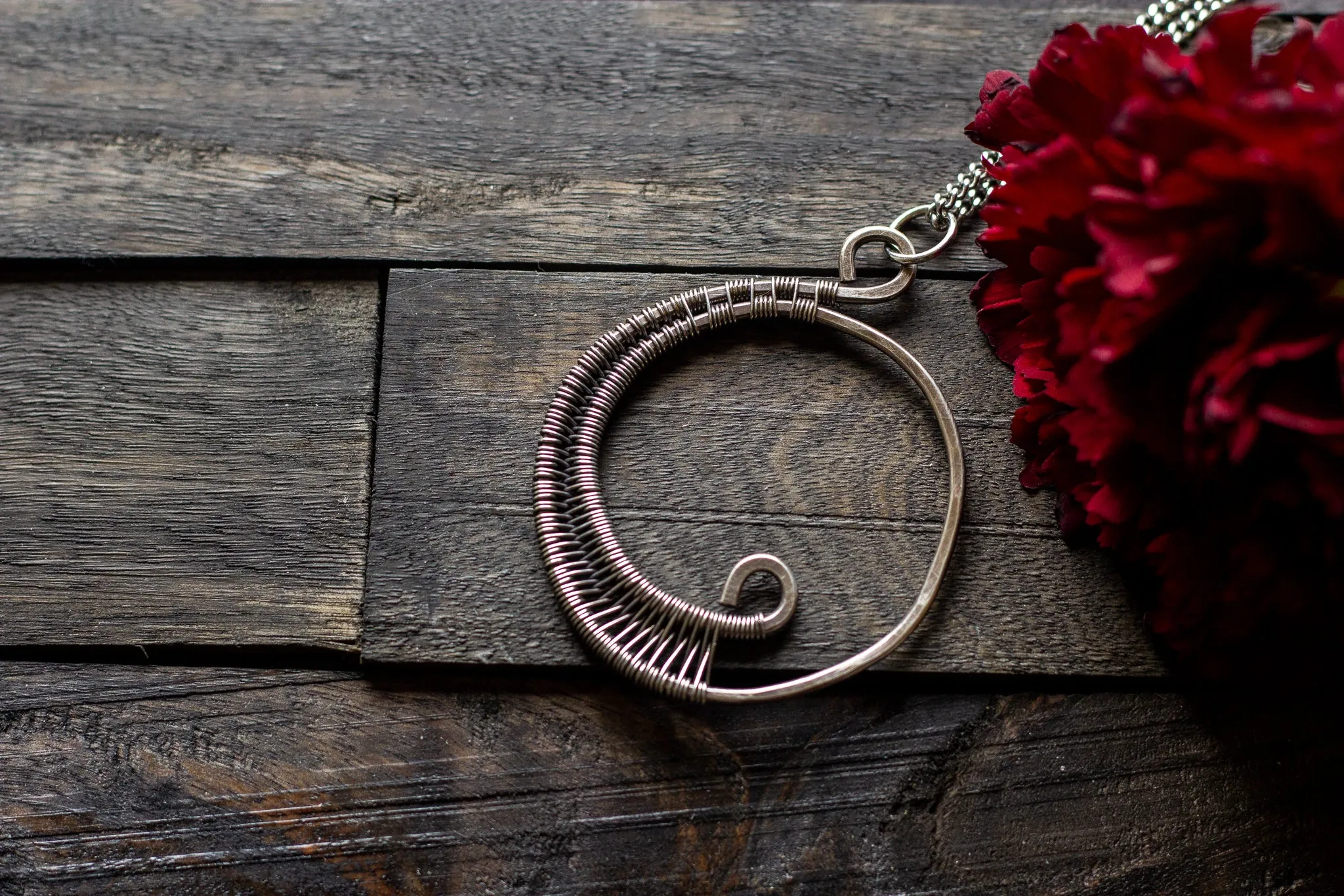 Circular Sterling Silver Wire Wrapped Pendant