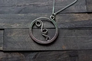 Circular Sterling Silver Wire Wrapped Pendant