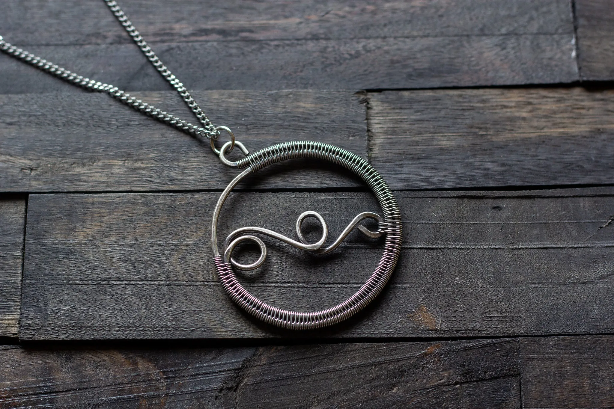 Circular Sterling Silver Wire Wrapped Pendant