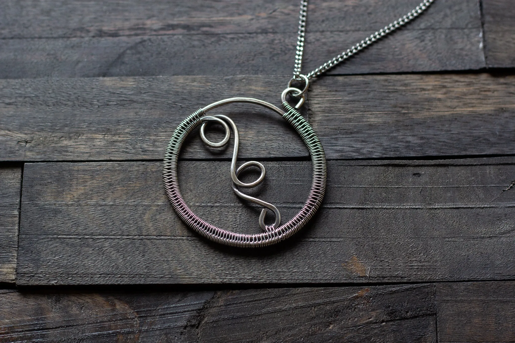 Circular Sterling Silver Wire Wrapped Pendant