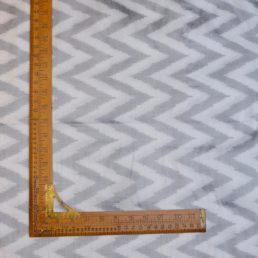 Dull White Dupion Silk Ikkat Fabric With Chevron Pattern
