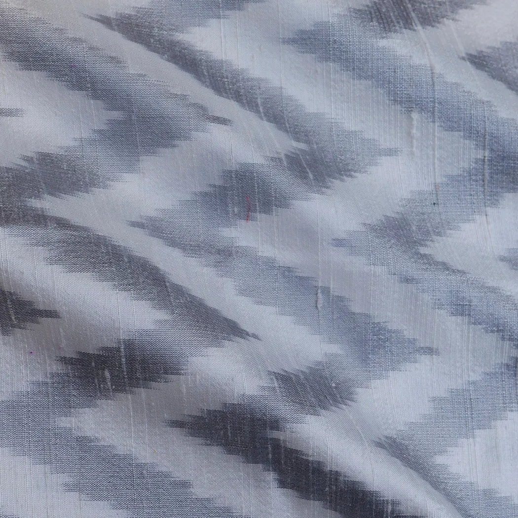 Dull White Dupion Silk Ikkat Fabric With Chevron Pattern