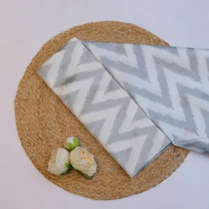 Dull White Dupion Silk Ikkat Fabric With Chevron Pattern