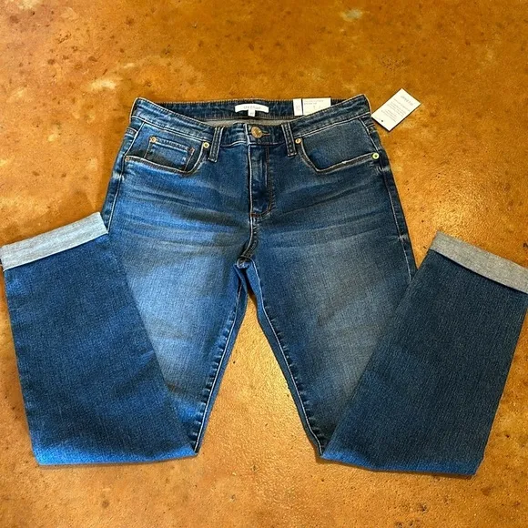 NWT STS Blue boyfriend slim jeans size 27. Waist flat 15”. Inseam cuffed 27”.