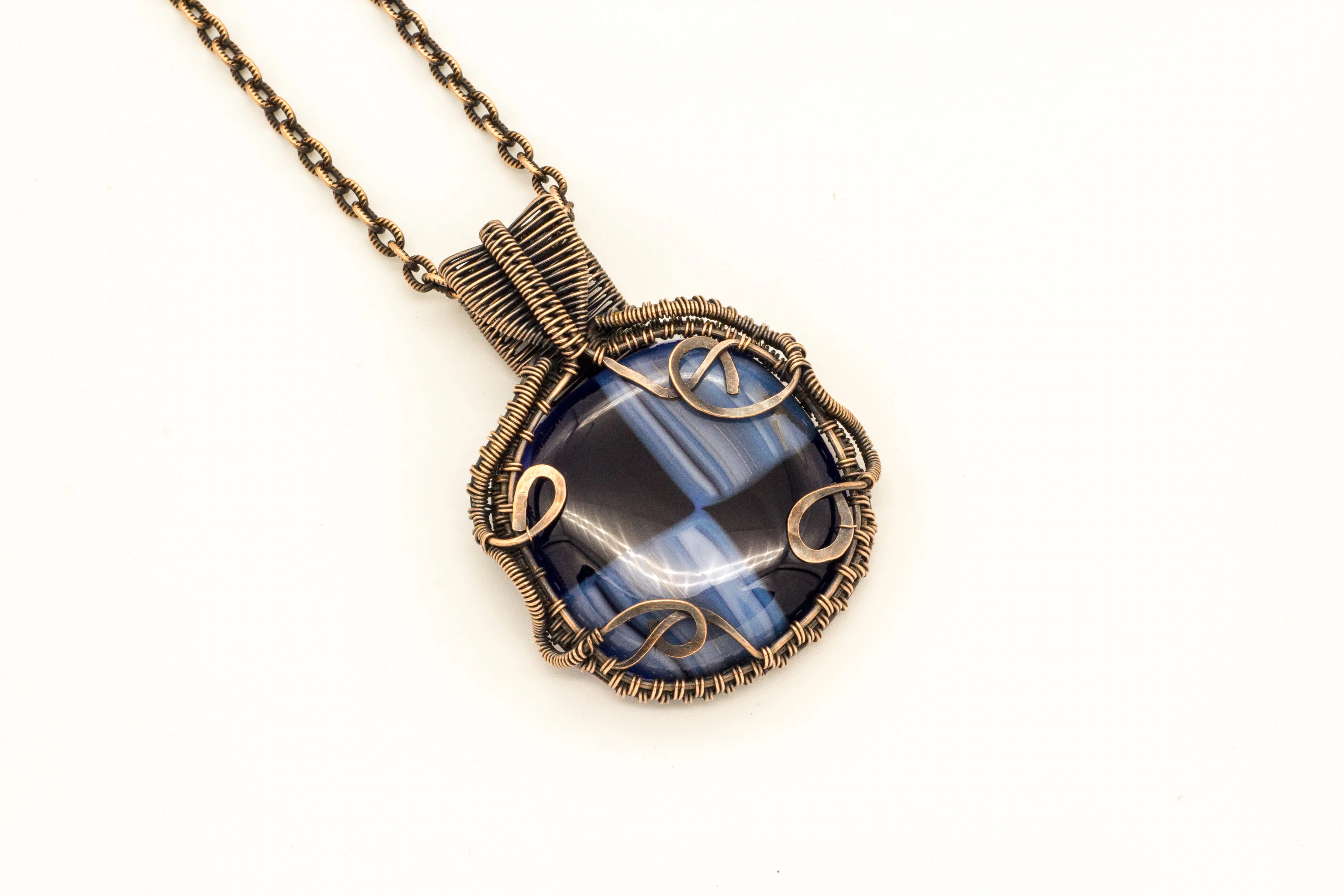 Reserved - Copper Wire Wrapped Pendant with Streaked Blue and Black Fused Glass