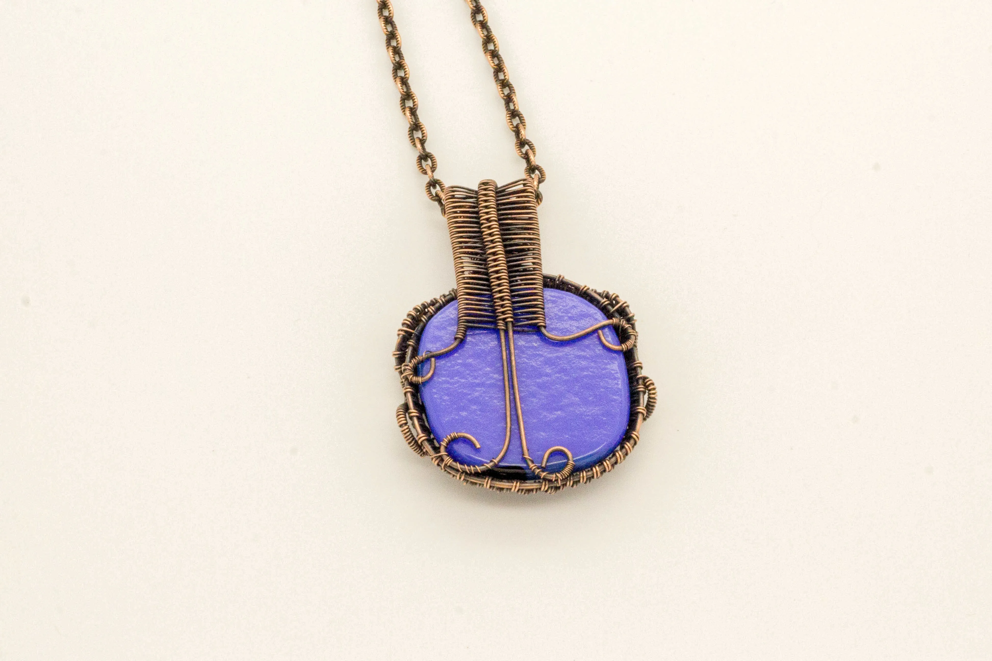Reserved - Copper Wire Wrapped Pendant with Streaked Blue and Black Fused Glass