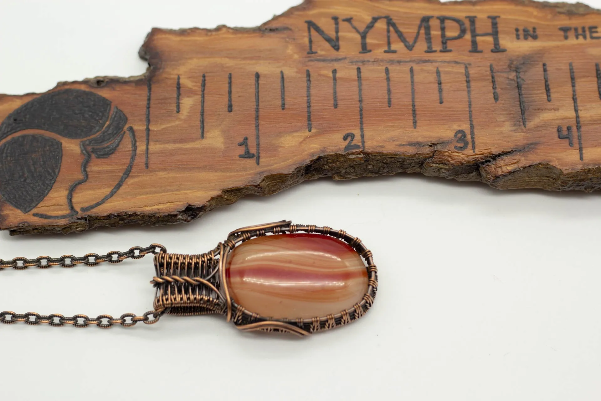 Streaked Orange Fused Glass Necklace with Copper Wire Wrapping