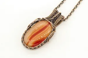 Streaked Orange Fused Glass Necklace with Copper Wire Wrapping