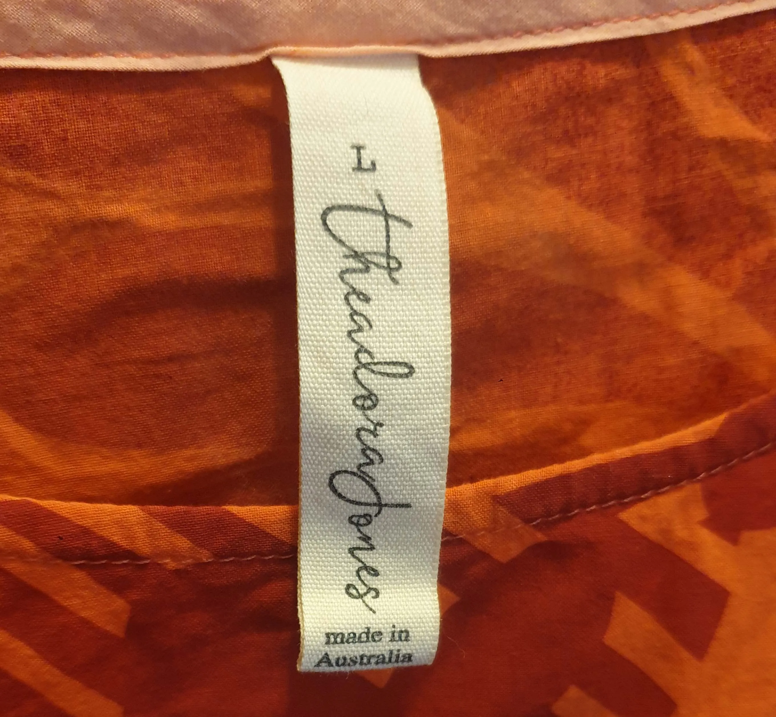 Theadora Jones red print top size L