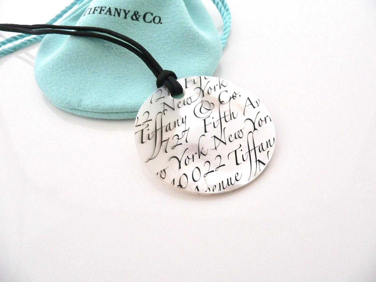 Tiffany & Co Mother of Pearl Necklace Notes Round Circle Pendant Love Gift Pouch Black Silk Cord Clasp