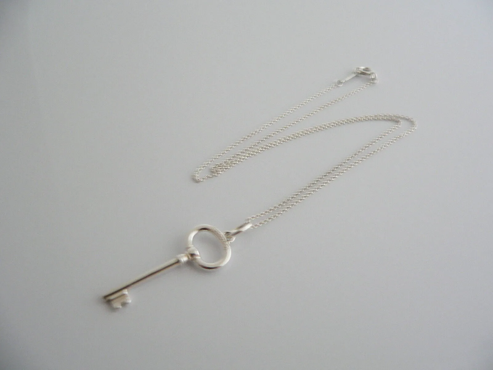 Tiffany & Co Silver Oval Key Necklace Pendant Charm 18 Inch Chain Gift Love Art