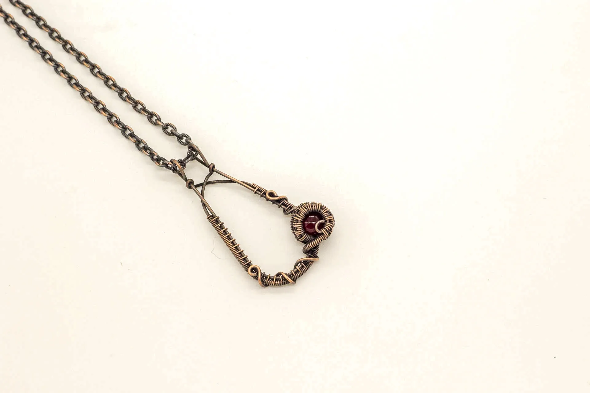 U-shaped Copper Pendant with Red Fused Glass Accent