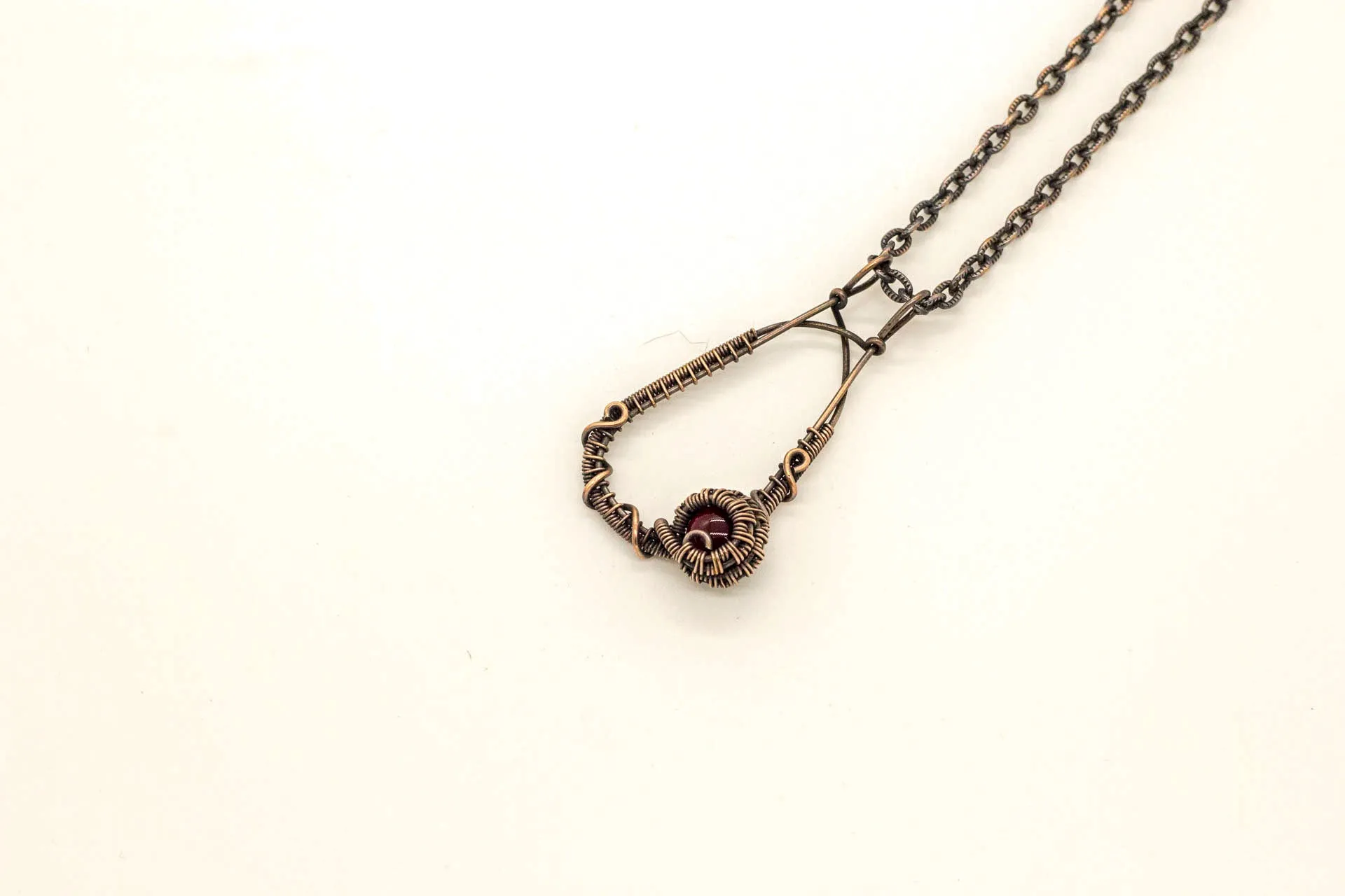 U-shaped Copper Pendant with Red Fused Glass Accent
