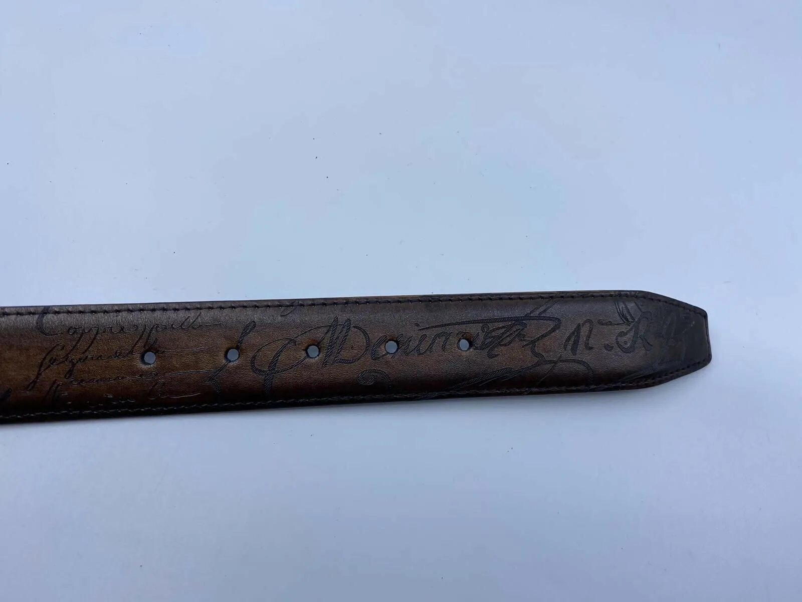 Versatile Reversible Scritto Leather Belt